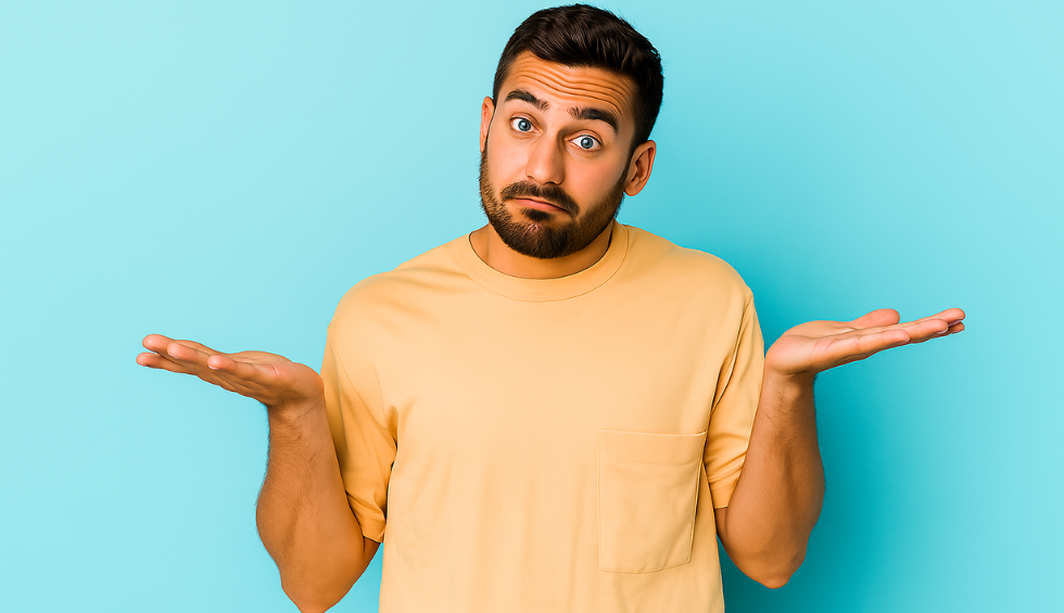 Confused man in yellow shirt shrugging against a blue background, symbolizing decision between live resin vs distillate