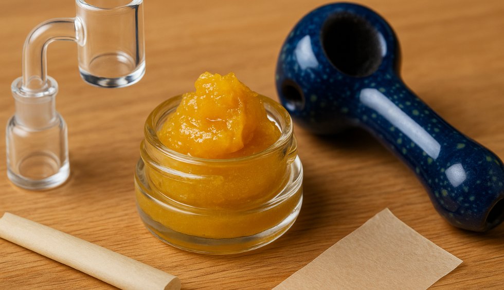 Glass dab rig, rosin concentrate, and smoking tools on a wooden surface, representing a common method of consuming rosin