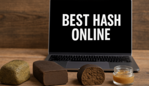 Various types of cannabis hash displayed in front of a laptop screen showing the text “Best Hash Online.”