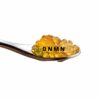 Bruce Banner OG cannabis caviar on spoon with bright golden oil bubbles